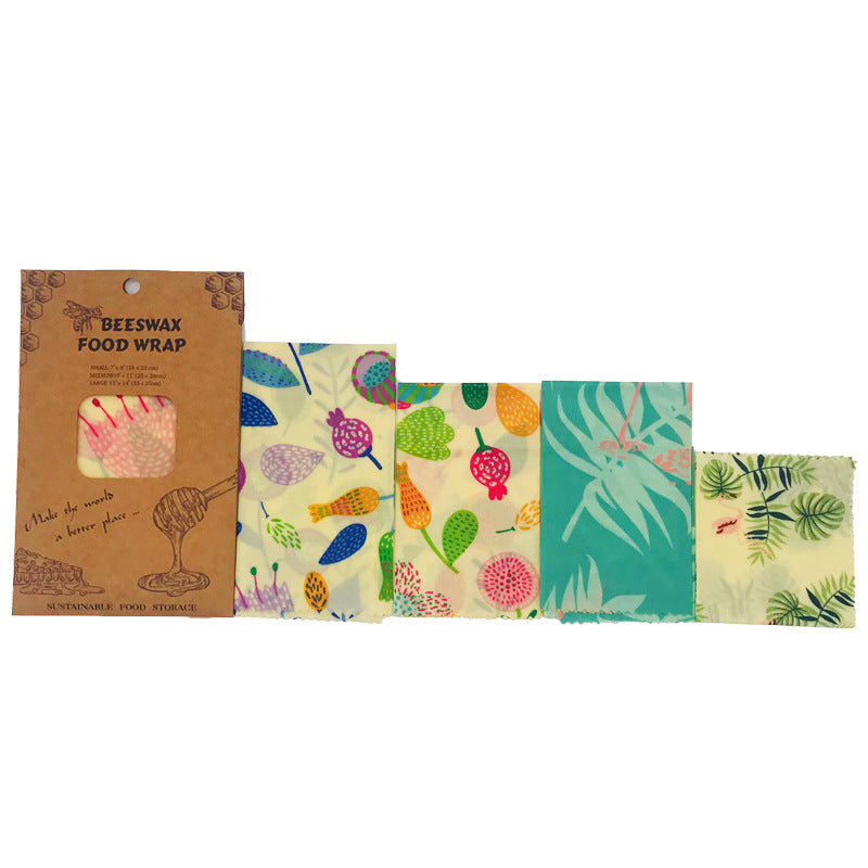 Beeswax wraps in use — wrapping cheese and bread for storage