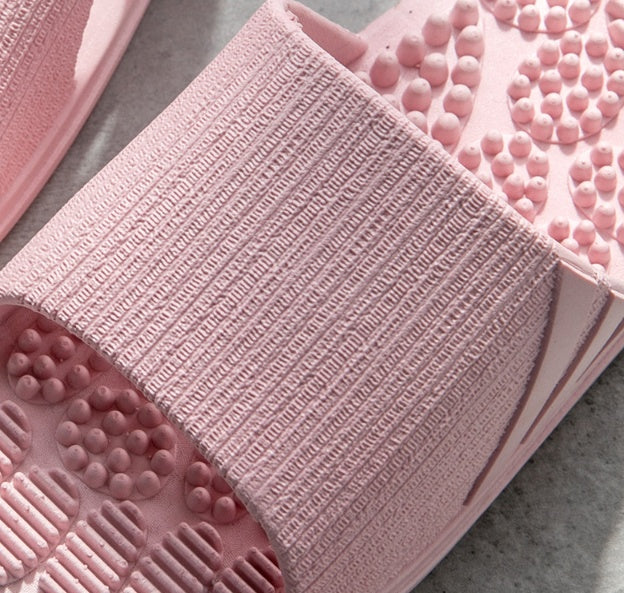 Acupressure sandals in purple — angled product view