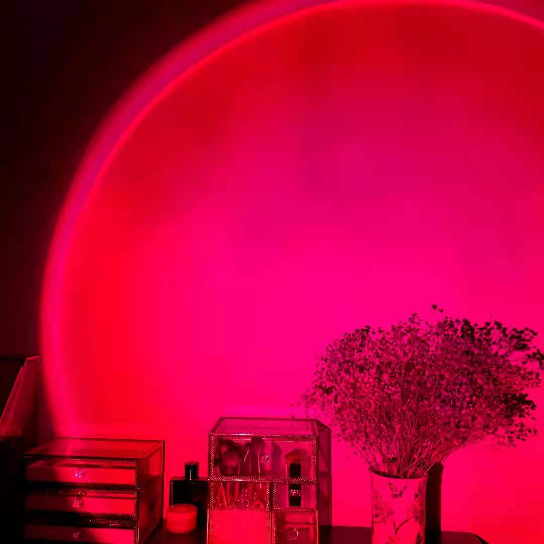 NestWell sunset lamp showing golden hour gradient on white wall